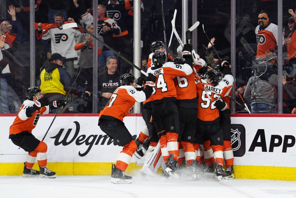 Apr 29, 2026; Philadelphia, Pennsylvania, USA; The Philadelphia Flyers celebrate after game six of the first round of the 2026 Stanley Cup Playoffs against the Pittsburgh Penguins at Xfinity Mobile Arena.