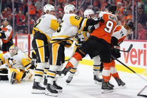 Apr 29, 2026; Philadelphia, Pennsylvania, USA; Pittsburgh Penguins center Noel Acciari (55) hits Philadelphia Flyers right wing Porter Martone (94) in the first period in game six of the first round of the 2026 Stanley Cup Playoffs at Xfinity Mobile Arena.