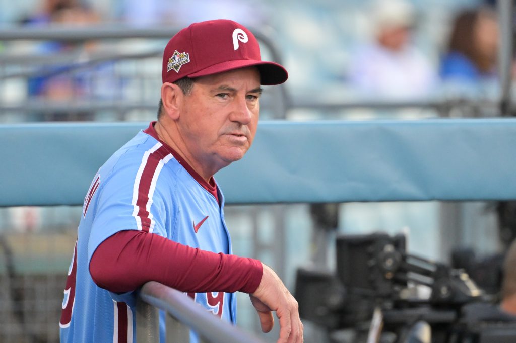 Oct 8, 2025; Los Angeles, California, USA; Philadelphia Phillies manager Rob Thomson (49) looks on before the game against the Los Angeles Dodgers during game three of the NLDS round for the 2025 MLB playoffs at Dodger Stadium.