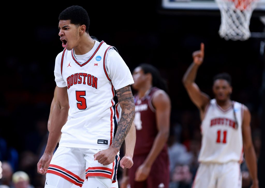 Houston's Chris Cenac Jr. (5) cheers during a second-round game in the NCAA men's basketball tournament between Houston Cougars and Texas A&M Aggies at Paycom Center in Oklahoma City, Saturday March 21, 2026.