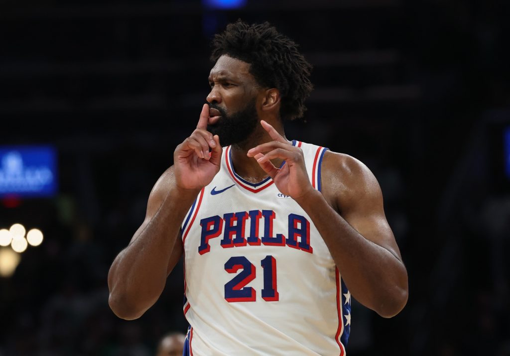 May 2, 2026; Boston, Massachusetts, USA; Philadelphia 76ers center Joel Embiid (21) silences the crowd after making a shot against the Boston Celtics during the second quarter of game seven of the first round of the 2026 NBA Playoffs at TD Garden.