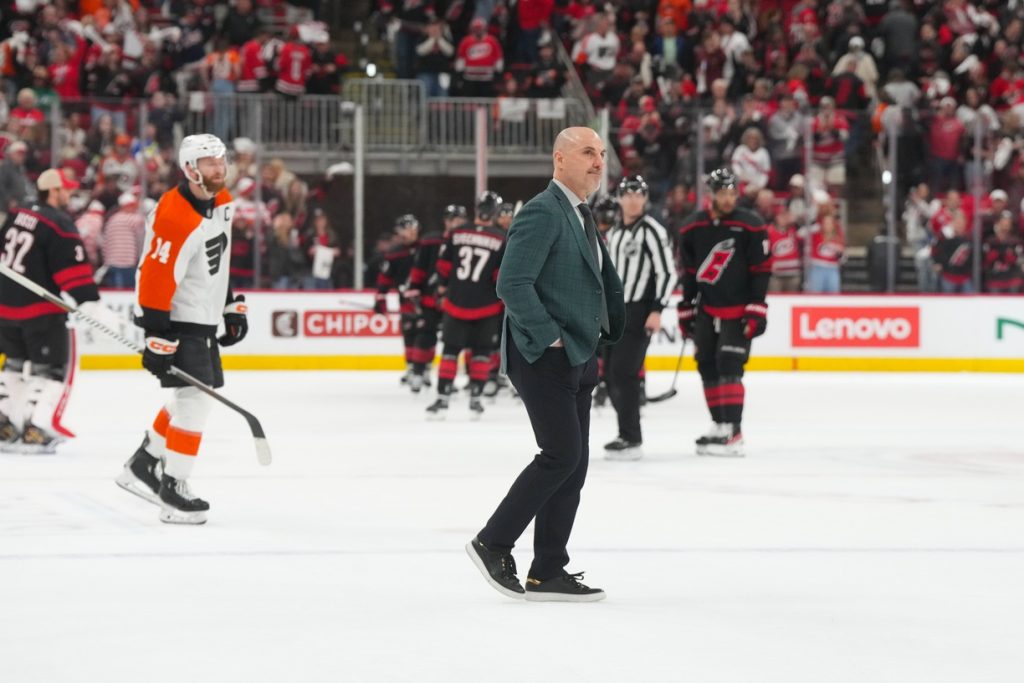 May 2, 2026; Raleigh, North Carolina, USA; Philadelphia Flyers head coach Rick Tocchet walk off the ice after their loss to the Carolina Hurricanes at Lenovo Center.