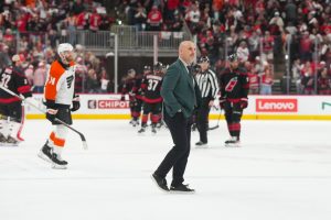 May 2, 2026; Raleigh, North Carolina, USA; Philadelphia Flyers head coach Rick Tocchet walk off the ice after their loss to the Carolina Hurricanes at Lenovo Center.