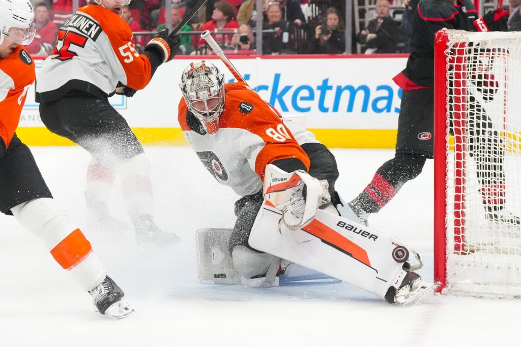 May 4, 2026; Raleigh, North Carolina, USA; Philadelphia Flyers goaltender Dan Vladar (80) makes a save against the Carolina Hurricanes during the third period in game two of the second round of the 2026 Stanley Cup Playoffs at Lenovo Center.