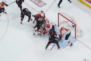 May 4, 2026; Raleigh, North Carolina, USA; Carolina Hurricanes left wing Taylor Hall (71) scores the game winning goal past Philadelphia Flyers goaltender Dan Vladar (80) and defenseman Travis Sanheim (6) during the first overtime in game two of the second round of the 2026 Stanley Cup Playoffs at Lenovo Center.