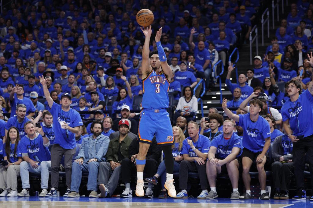 May 5, 2026; Oklahoma City, Oklahoma, USA; Oklahoma City Thunder guard Jared McCain (3) shoots a three point basket against the Los Angeles Lakers in the second half during game one of the second round of the 2026 NBA Playoffs at Paycom Center.
