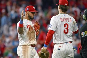 May 6, 2026; Philadelphia, Pennsylvania, USA; Philadelphia Phillies second baseman Edmundo Sosa (33) celebrates win with first baseman Bryce Harper (3) against the Athletics at Citizens Bank Park.