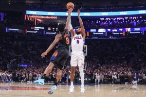 May 6, 2026; New York, New York, USA; Philadelphia 76ers forward Paul George (8) takes a three point shot past New York Knicks forward Og Anunoby (8) during game five of the second round of the 2026 NBA Playoffs at Madison Square Garden.