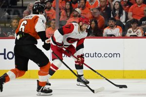 May 7, 2026; Philadelphia, Pennsylvania, USA; Carolina Hurricanes left wing Taylor Hall (71) looks to shoot the puck against Philadelphia Flyers defenseman Travis Sanheim (6) during the second period in game three of the second round of the 2026 Stanley Cup Playoffs at Xfinity Mobile Arena.