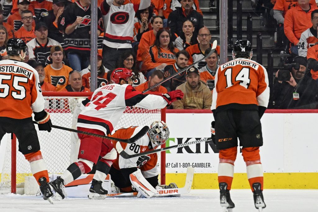 May 7, 2026; Philadelphia, Pennsylvania, USA; Carolina Hurricanes center Seth Jarvis (24) celebrates a goal against Philadelphia Flyers goaltender Dan Vladar (80) scored by right wing Andrei Svechnikov (37) (not pictured) during the third period in game three of the second round of the 2026 Stanley Cup Playoffs at Xfinity Mobile Arena.