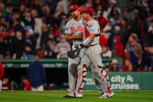 May 12, 2026; Boston, Massachusetts, USA; Philadelphia Phillies pitcher Jhoan Duran (59) and catcher J.T. Realmuto (10) react after defeating the Boston Red Sox at Fenway Park.