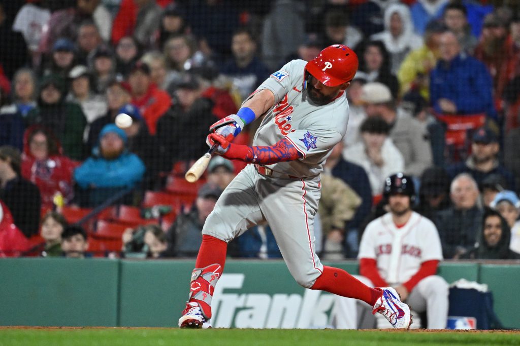 May 14, 2026; Boston, Massachusetts, USA; Philadelphia Phillies designated hitter Kyle Schwarber (12) hits a two run home run during the eighth inning against the Boston Red Sox at Fenway Park.