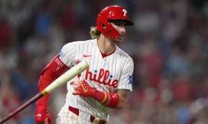 May 18, 2026; Philadelphia, Pennsylvania, USA; Philadelphia Phillies infielder Bryson Stott (5) tosses his bat after hitting a two-run home run against the Cincinnati Reds in the eighth inning at Citizens Bank Park.