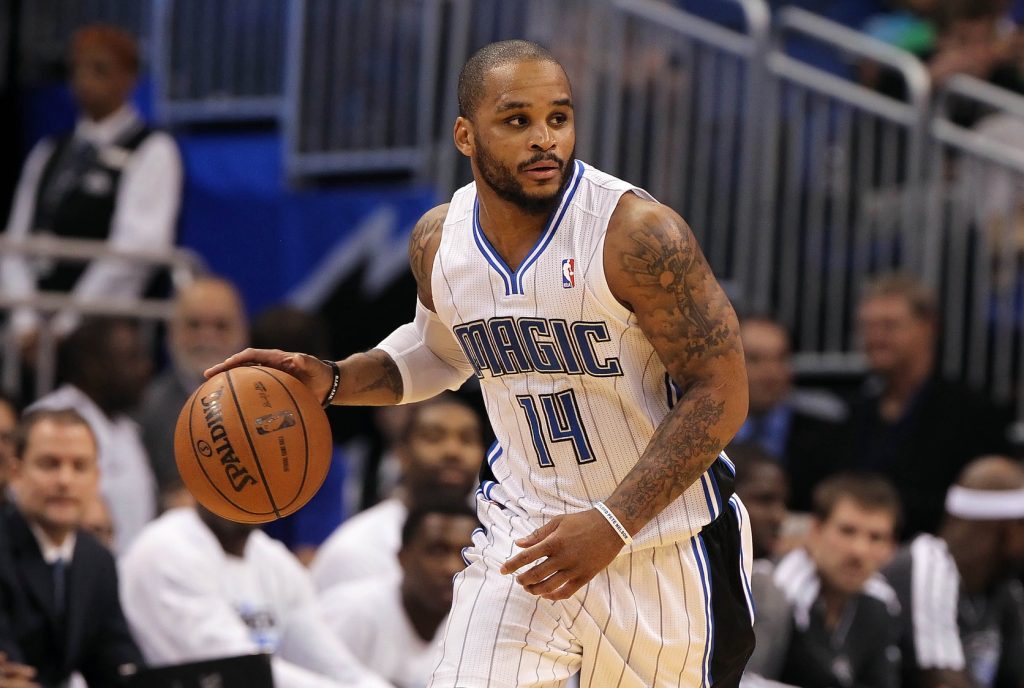 March 10, 2013; Orlando FL, USA; Orlando Magic point guard Jameer Nelson (14) dribbles the ball against the Philadelphia 76ers during the second half at Amway Center. Orlando Magic defeated the Philadelphia 76ers 99-91.
