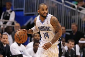 March 10, 2013; Orlando FL, USA; Orlando Magic point guard Jameer Nelson (14) dribbles the ball against the Philadelphia 76ers during the second half at Amway Center. Orlando Magic defeated the Philadelphia 76ers 99-91.