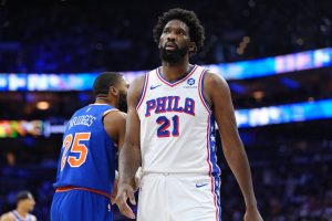 May 10, 2026; Philadelphia, Pennsylvania, USA; Philadelphia 76ers center Joel Embiid (21) reacts against the New York Knicks in the first quarter during game four of the second round of the 2026 NBA Playoffs at Xfinity Mobile Arena.
