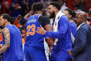 Apr 30, 2026; Atlanta, Georgia, USA; New York Knicks center Mitchell Robinson (23) talks to center Karl-Anthony Towns (32) after an altercation with Atlanta Hawks guard Dyson Daniels (not pictured) in the second quarter during game six of the first round of the 2026 NBA Playoffs at State Farm Arena.