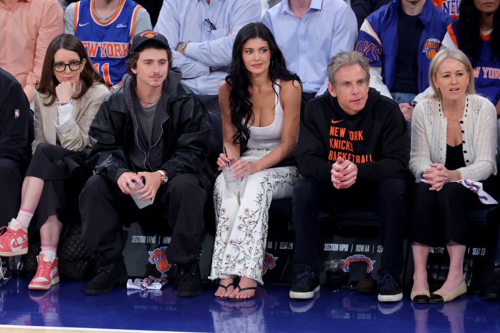 Apr 28, 2026; New York, New York, USA; Left to right: Tina Fey and Timothee Chalamet and Kylie Jenner and Ben Stiller and Christine Taylor sit court side during the first quarter of game five of the first round of the 2026 NBA Playoffs between the New York Knicks and Atlanta Hawks at Madison Square Garden.