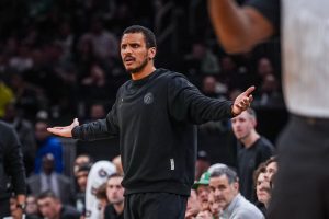 Apr 28, 2026; Boston, Massachusetts, USA; Boston Celtics head coach Joe Mazzulla watches from the sideline as they take on the Philadelphia 76ers during game five of the first round of the 2026 NBA Playoffs at TD Garden.