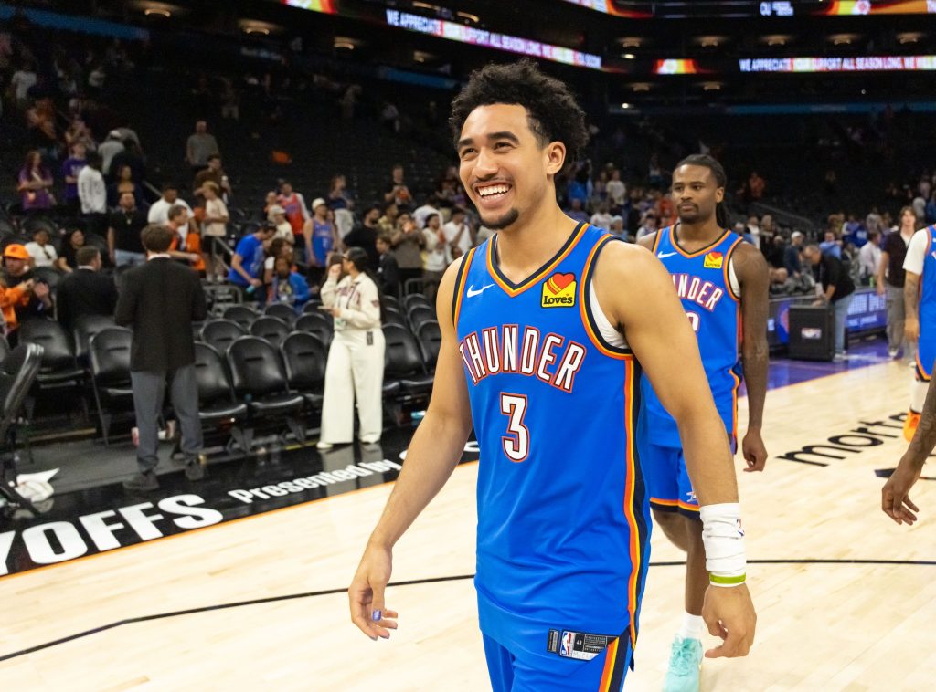 Apr 27, 2026; Phoenix, Arizona, USA; Oklahoma City Thunder guard Jared McCain (3) against the Phoenix Suns during game four of the first round of the 2026 NBA Playoffs at Mortgage Matchup Center.