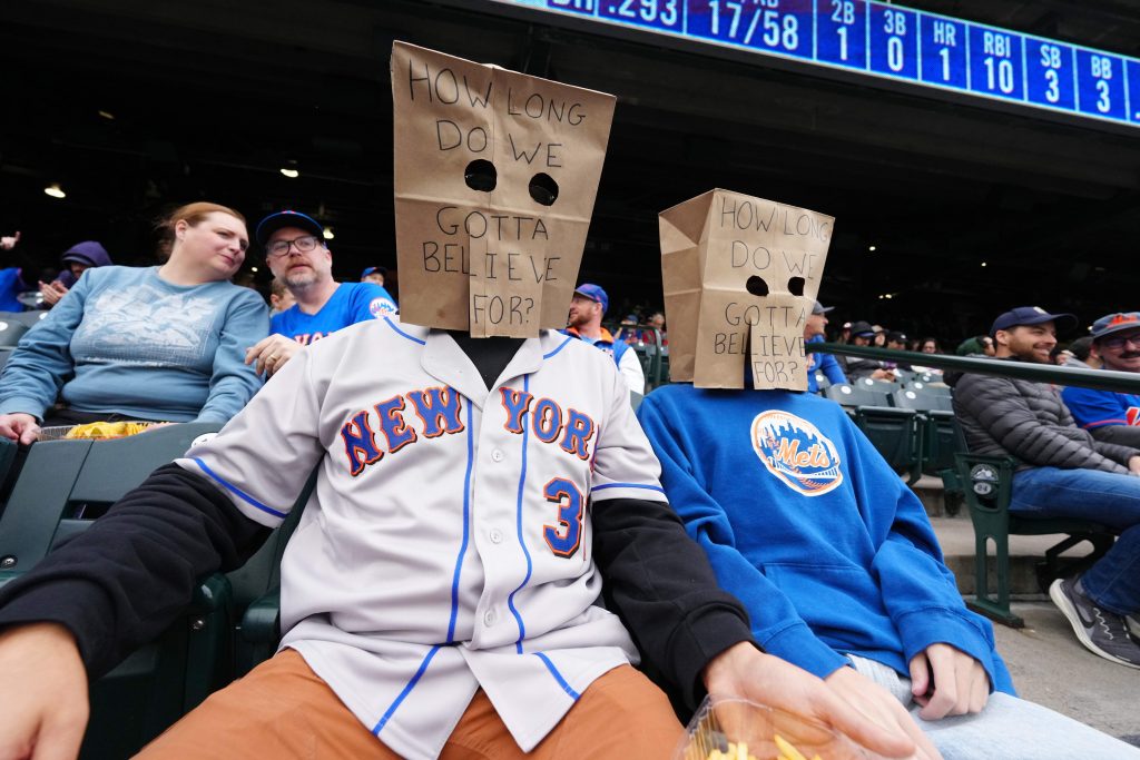 May 4, 2026; Denver, Colorado, USA; A pair of New York Mets fans during the third inning against the Colorado Rockies at Coors Field.