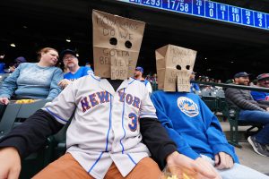 May 4, 2026; Denver, Colorado, USA; A pair of New York Mets fans during the third inning against the Colorado Rockies at Coors Field.