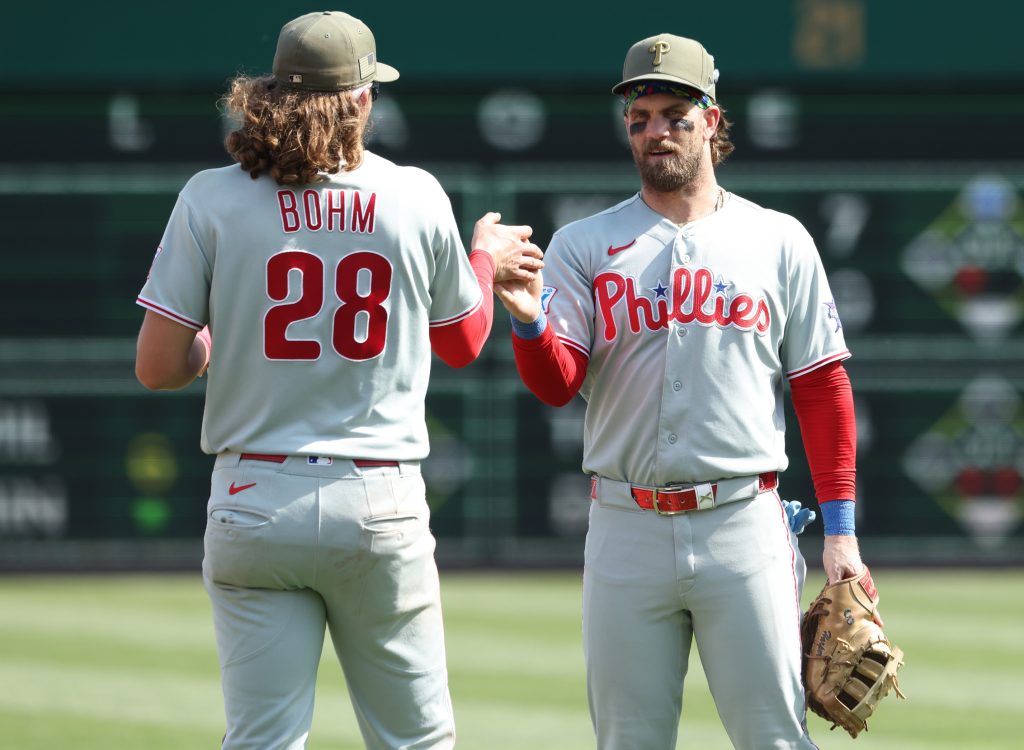 May 17, 2026; Pittsburgh, Pennsylvania, USA; Philadelphia Phillies third baseman Alec Bohm (28) and first baseman Bryce Harper (right) celebrate after defeating the Pittsburgh Pirates at PNC Park.