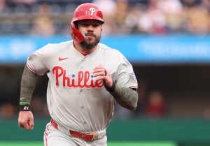 May 15, 2026; Pittsburgh, Pennsylvania, USA; Philadelphia Phillies designated hitter Kyle Schwarber (12) runs from first base to third base against the Pittsburgh Pirates during the first inning at PNC Park.