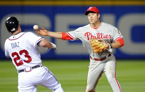 Apr 22, 2010; Atlanta, GA, USA; Philadelphia Phillies second baseman Chase Utley (26) can not turn a double play as a result of the slide of Atlanta Braves right fielder Matt Diaz (23) in the fifth inning at Turner Field.