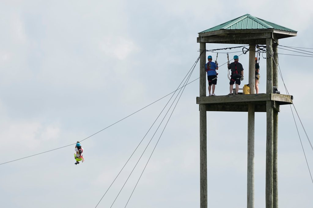 Visitors zipline at The Wilds in Cumberland, Ohio on Aug. 19, 2025.