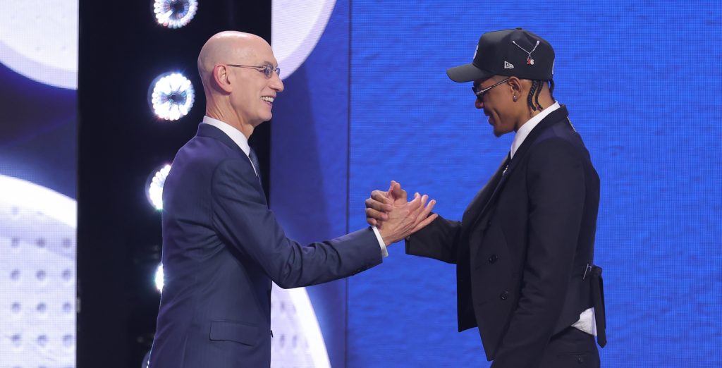 Jun 23, 2026; New York, NY, USA; NBA commissioner Adam Silver greets the twenty second pick in the 2026 NBA draft, Alabama guard Labaron Philon Jr. after he was selected by the Philadelphia 76ers at Barclays Center.