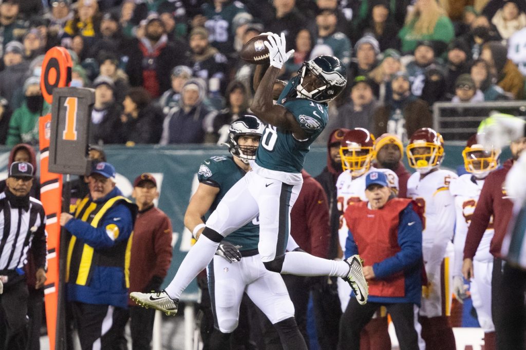 Dec 21, 2021; Philadelphia, Pennsylvania, USA; Philadelphia Eagles wide receiver Jalen Reagor (18) makes a catch against the Washington Football Team during the second quarter at Lincoln Financial Field.