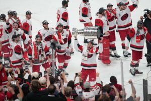 Jun 14, 2026; Las Vegas, Nevada, USA; Carolina Hurricanes celebrate with the Stanley Cup after defeating Vegas Golden Knights in game six of the 2026 Stanley Cup Final at T-Mobile Arena.