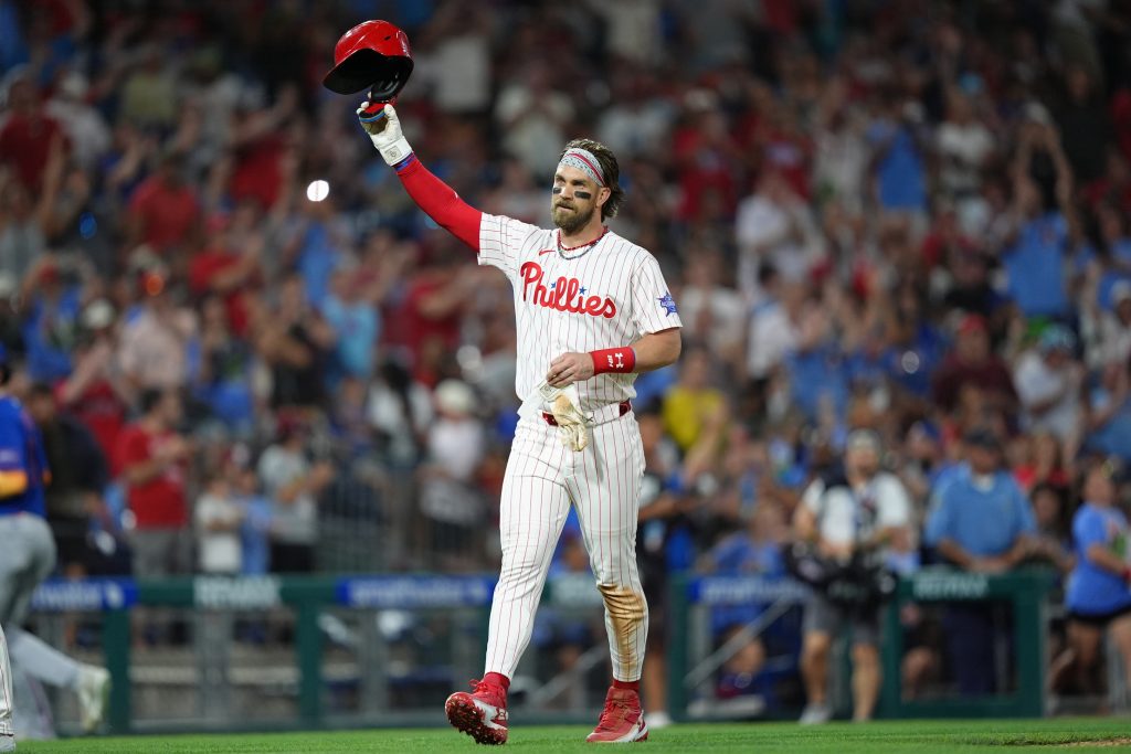 Jun 20, 2026; Philadelphia, Pennsylvania, USA; Philadelphia Phillies infielder Bryce Harper (3) reacts after hitting an RBI triple against the New York Mets in the fifth inning at Citizens Bank Park.