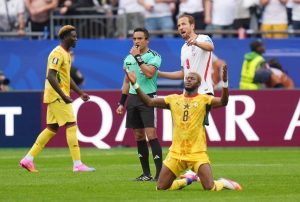 June 23, 2026; Foxborough, Massachusetts, U.S.; Ghana's Kwasi Sibo celebrates as England's Harry Kane talks to referee Said Martinez after the match.