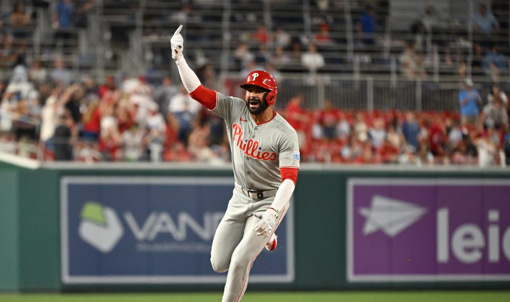 Jun 24, 2026; Washington, District of Columbia, USA; Philadelphia Phillies right fielder Derek Hill (49) reacts after hitting a two run home run against the Washington Nationals during the ninth inning at Nationals Park.