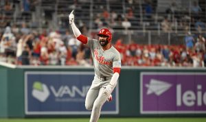 Jun 24, 2026; Washington, District of Columbia, USA; Philadelphia Phillies right fielder Derek Hill (49) reacts after hitting a two run home run against the Washington Nationals during the ninth inning at Nationals Park.