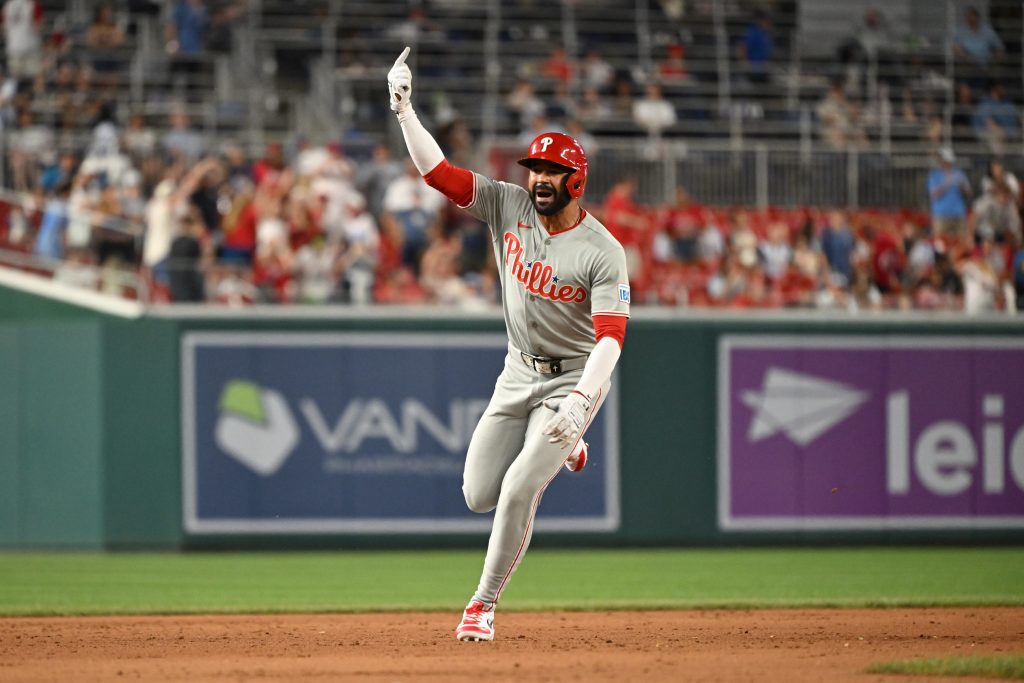 Jun 24, 2026; Washington, District of Columbia, USA; Philadelphia Phillies right fielder Derek Hill (49) reacts after hitting a two run home run against the Washington Nationals during the ninth inning at Nationals Park.