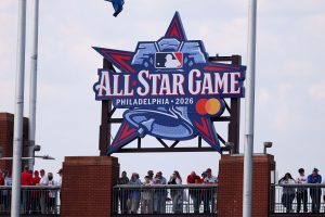 Mar 26, 2026; Philadelphia, Pennsylvania, USA; Fans stand under a 2026 All Star Game sign during a game between the Philadelphia Phillies and the Texas Rangers at Citizens Bank Park.