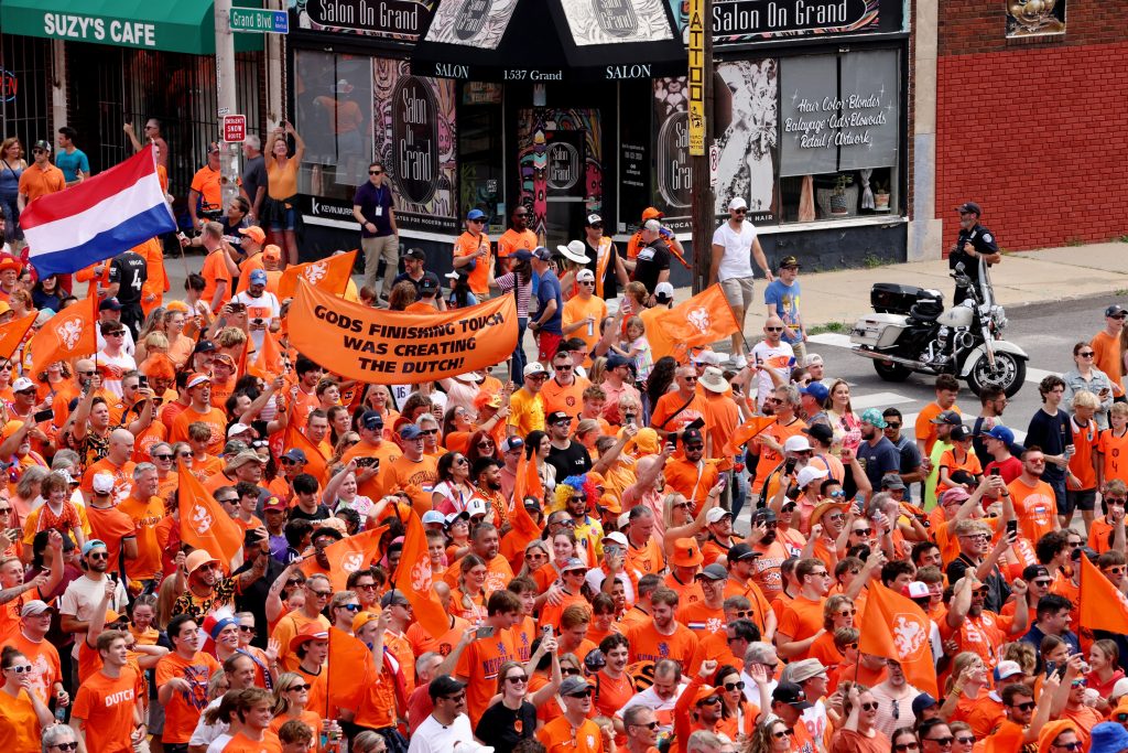 June 25, 2026; Missouri, U.S.; Netherlands fans display a banner as they march towards the Kansas City Stadium ahead of the match.