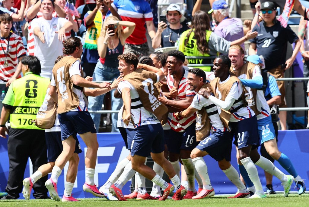 June 19, 2026; Seattle, Washington, U.S.; Alex Freeman of the U.S. celebrates scoring their second goal with teammates.