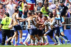 June 19, 2026; Seattle, Washington, U.S.; Alex Freeman of the U.S. celebrates scoring their second goal with teammates.