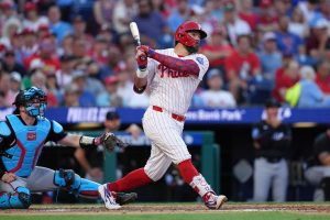 Jun 16, 2026; Philadelphia, Pennsylvania, USA; Philadelphia Phillies designated hitter Kyle Schwarber (12) hits a home run against the Miami Marlins in the fourth inning at Citizens Bank Park.