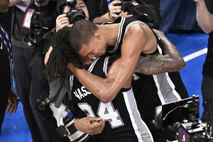 May 30, 2026; Oklahoma City, Oklahoma, USA; San Antonio Spurs forward Victor Wembanyama (1) celebrates with guard Devin Vassell (24) after defeating the Oklahoma City Thunder in game seven of the western conference finals for the 2026 NBA playoffs at Paycom Center.