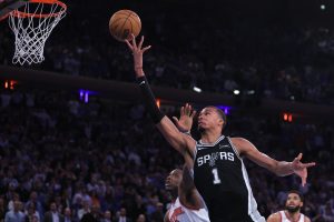 Jun 10, 2026; New York, New York, USA; San Antonio Spurs forward Victor Wembanyama (1) shoots against New York Knicks forward Og Anunoby (8) in the fourth quarter during game four of the 2026 NBA Finals at Madison Square Garden.
