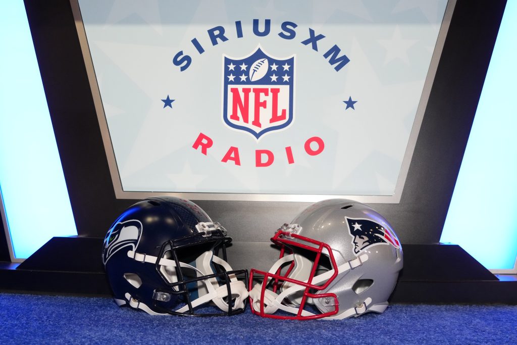 Feb 3, 2026; San Francisco, CA, USA; Seattle Seahawks and New England Patriots helmets on the SiriusXM NFL radio set at the Super Bowl LX media center at the Moscone Center.
