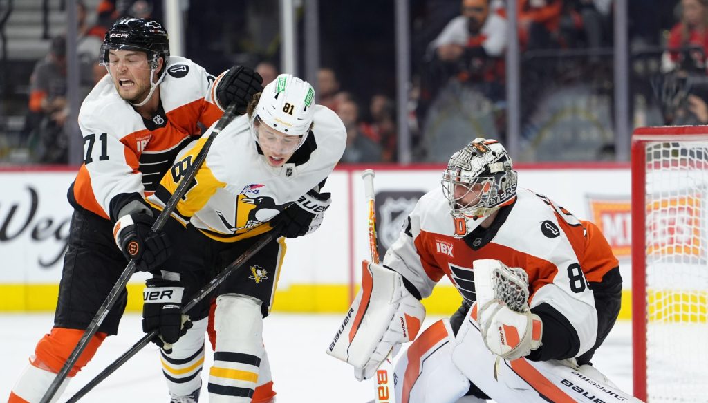 Apr 29, 2026; Philadelphia, Pennsylvania, USA; Philadelphia Flyers right wing Tyson Foerster (71) hits Pittsburgh Penguins center Ben Kindel (81) as Philadelphia Flyers goalie Dan Vladar (80) defends the net in the second period in game six of the first round of the 2026 Stanley Cup Playoffs at Xfinity Mobile Arena.