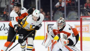 Apr 29, 2026; Philadelphia, Pennsylvania, USA; Philadelphia Flyers right wing Tyson Foerster (71) hits Pittsburgh Penguins center Ben Kindel (81) as Philadelphia Flyers goalie Dan Vladar (80) defends the net in the second period in game six of the first round of the 2026 Stanley Cup Playoffs at Xfinity Mobile Arena.