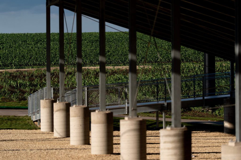 A field of growing corn is pictured beyond the supports for a section of seats at the Field of Dreams Ballpark June 17, 2026 in Dyersville, Iowa.