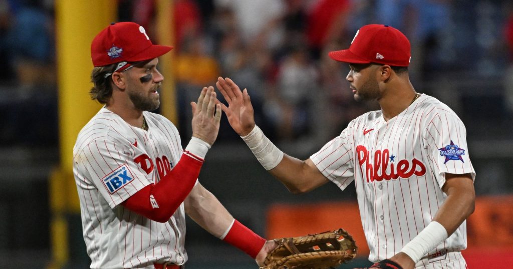 Jun 30, 2026; Philadelphia, Pennsylvania, USA; Philadelphia Phillies first baseman Bryce Harper (3) and center fielder Justin Crawford (2) celebrate win against the Pittsburgh Pirates at Citizens Bank Park.